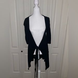 Black tie around cardigan